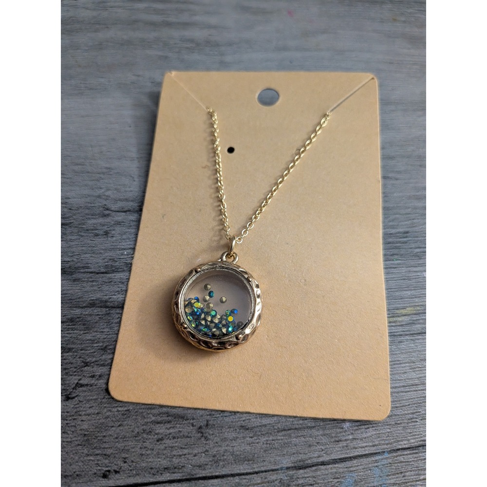 Gold Tone Round Shaker Locket Necklace with Iridescent Floating Crystals